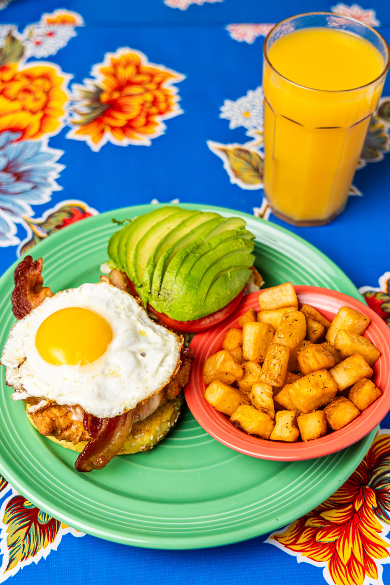 Breakfast Burger with moon Dusted Potatoes and Orange Juice