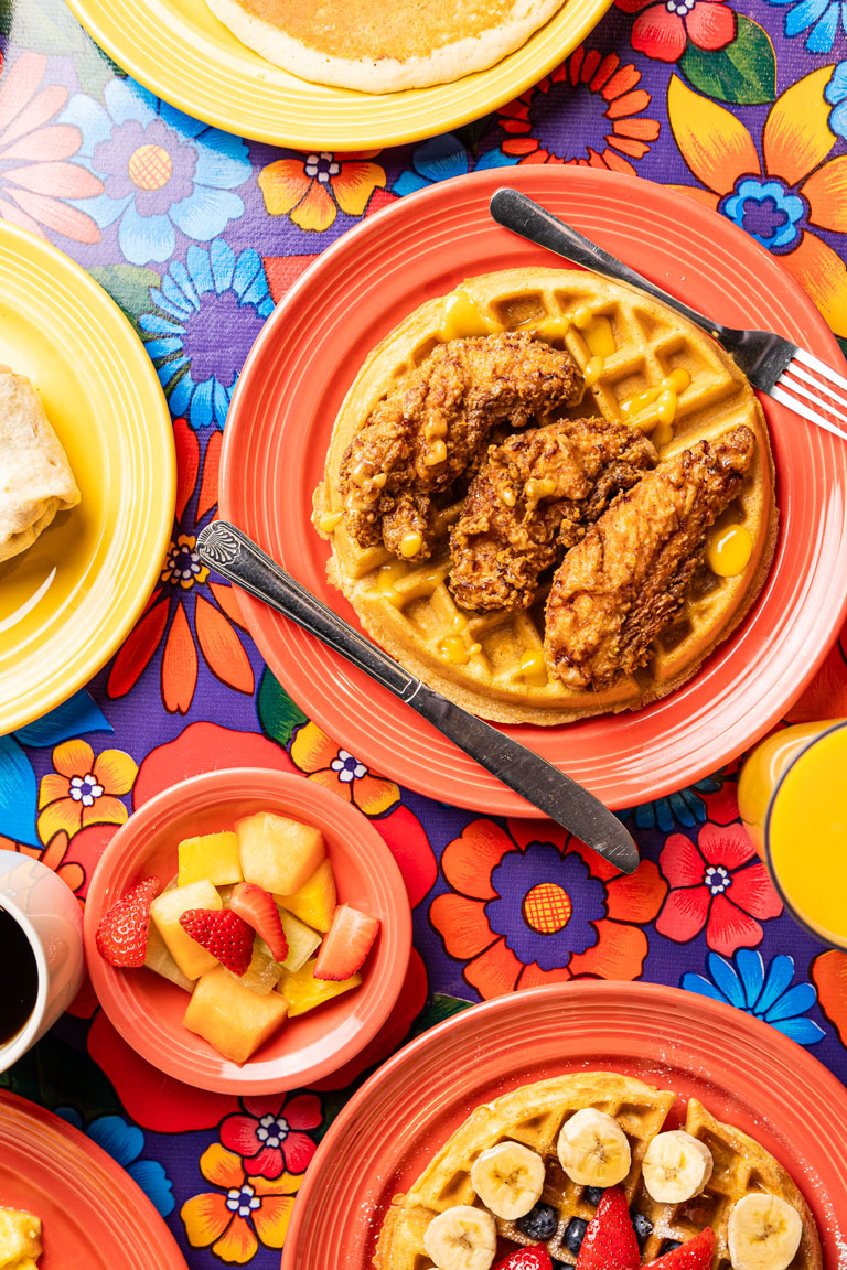 Chicken and Waffle with side of Fruit, Coffee and Orange Juice